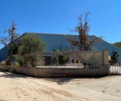 Σπατα κτιριο 8000τμ σε οικοπεδο 28 στρεμματα με φωτοβολταικα και χρηση Ανακυκλωσης